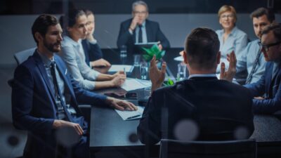 Picture of a Cybersecurity meeting with executives and supervisors